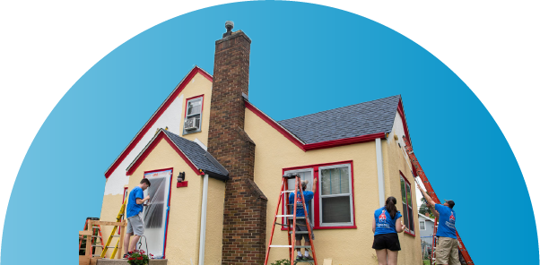 Hearts & Hammers volunteers improving a home's exterior