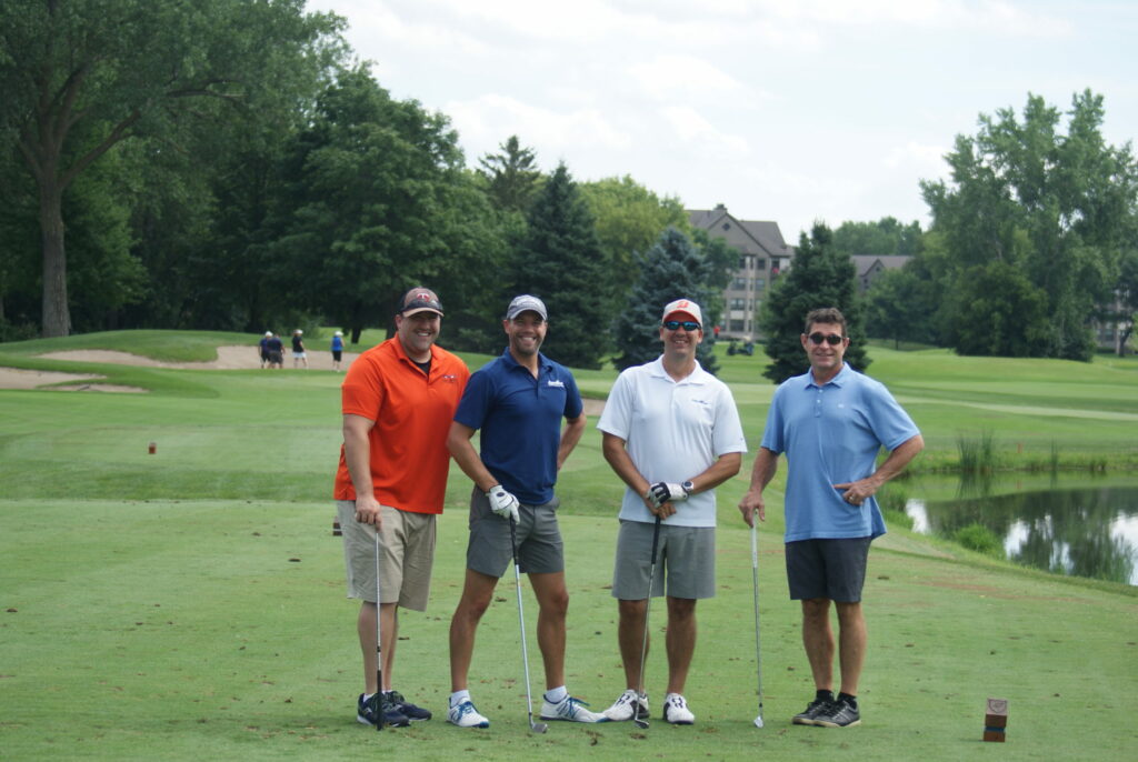 A group photo from the Hearts & Hammers 2022 Golf Classic